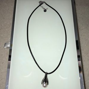Black cord necklace with drop.